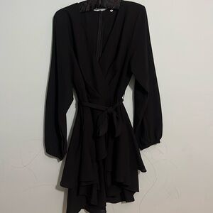 Long sleeve black dress.